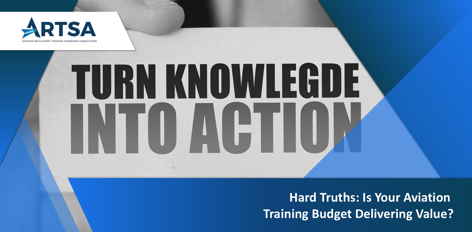 A hand holding a white card with the handwritten phrase "Turn Knowledge Into Action" against a blurred office background.